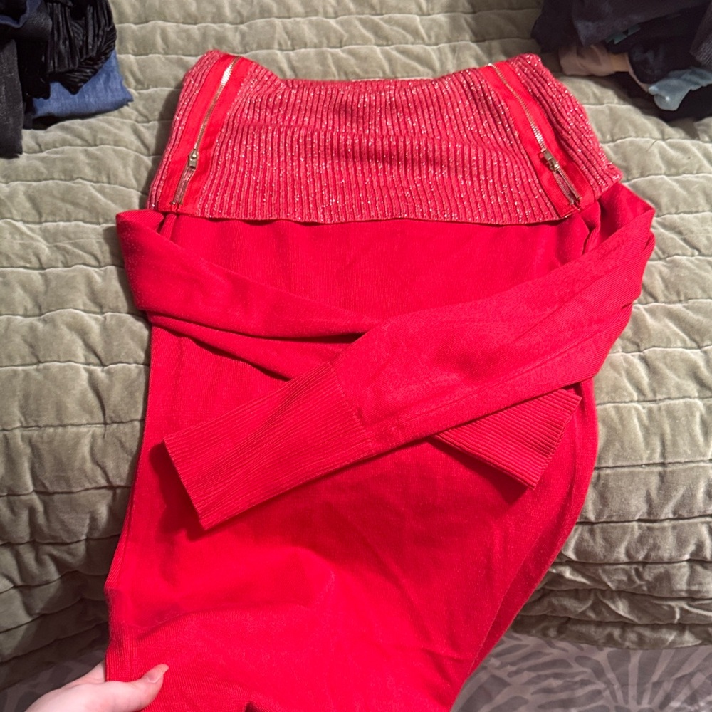 Red sparkly sweater dress 

Off shoulder / boat neck